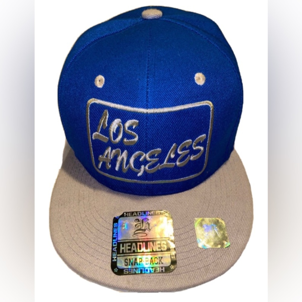 Headlines Men’s Los Angeles Blue SnapBack Hats.